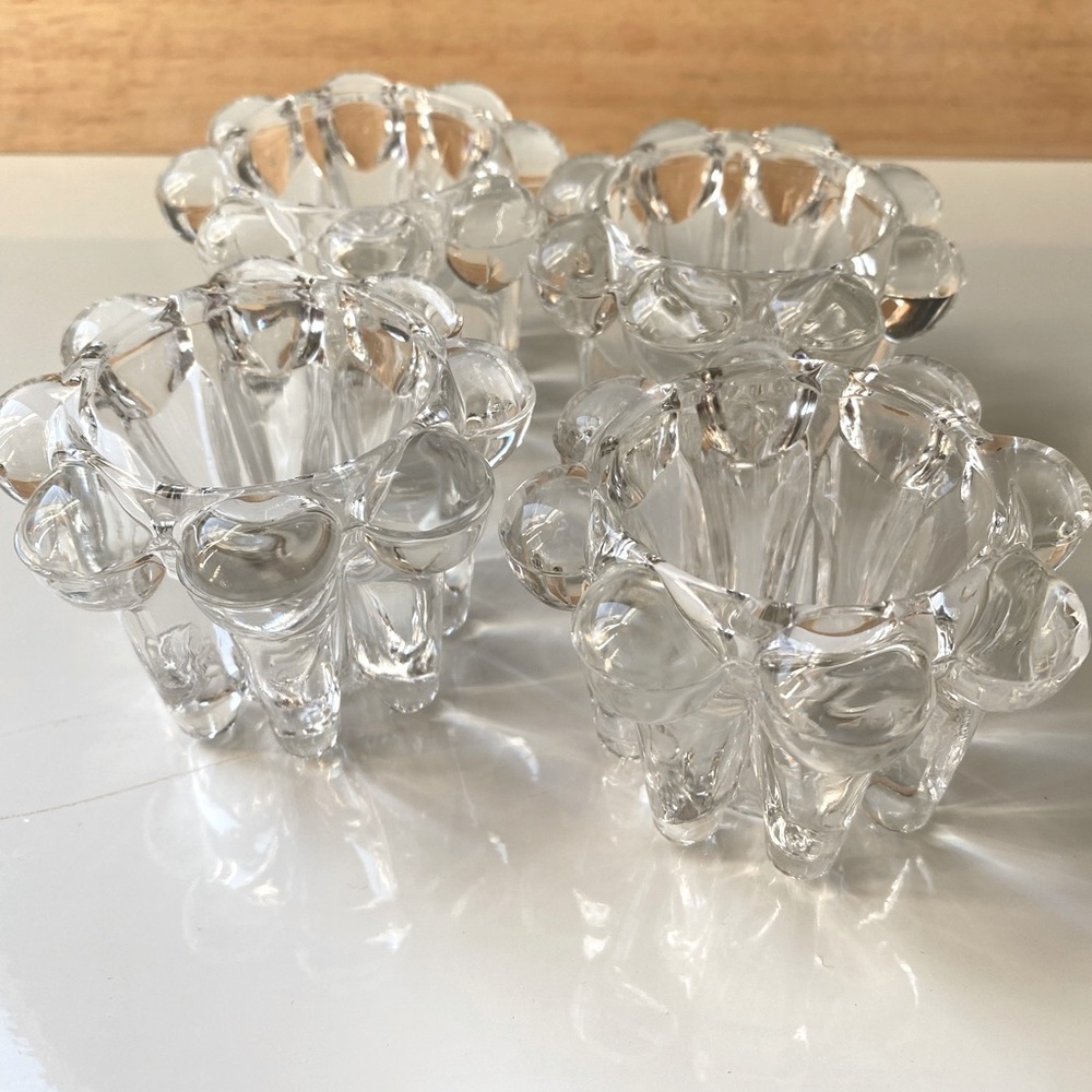 4 Crystal clear Candle Holders.